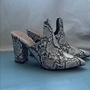 Wild Pair Black and White Snakeskin Mules like new